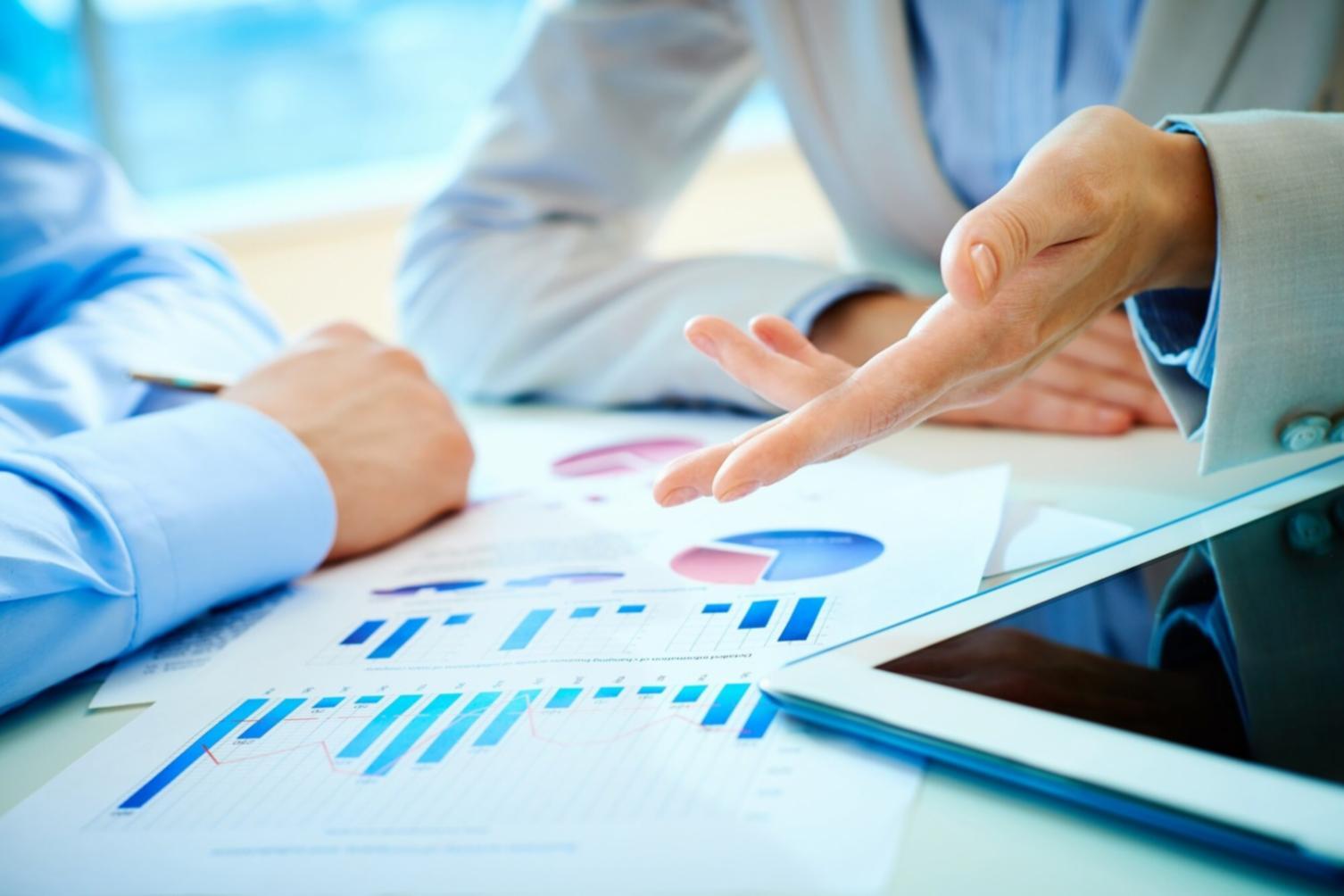 collaborative learning environment with students working on blockchain insurance projects